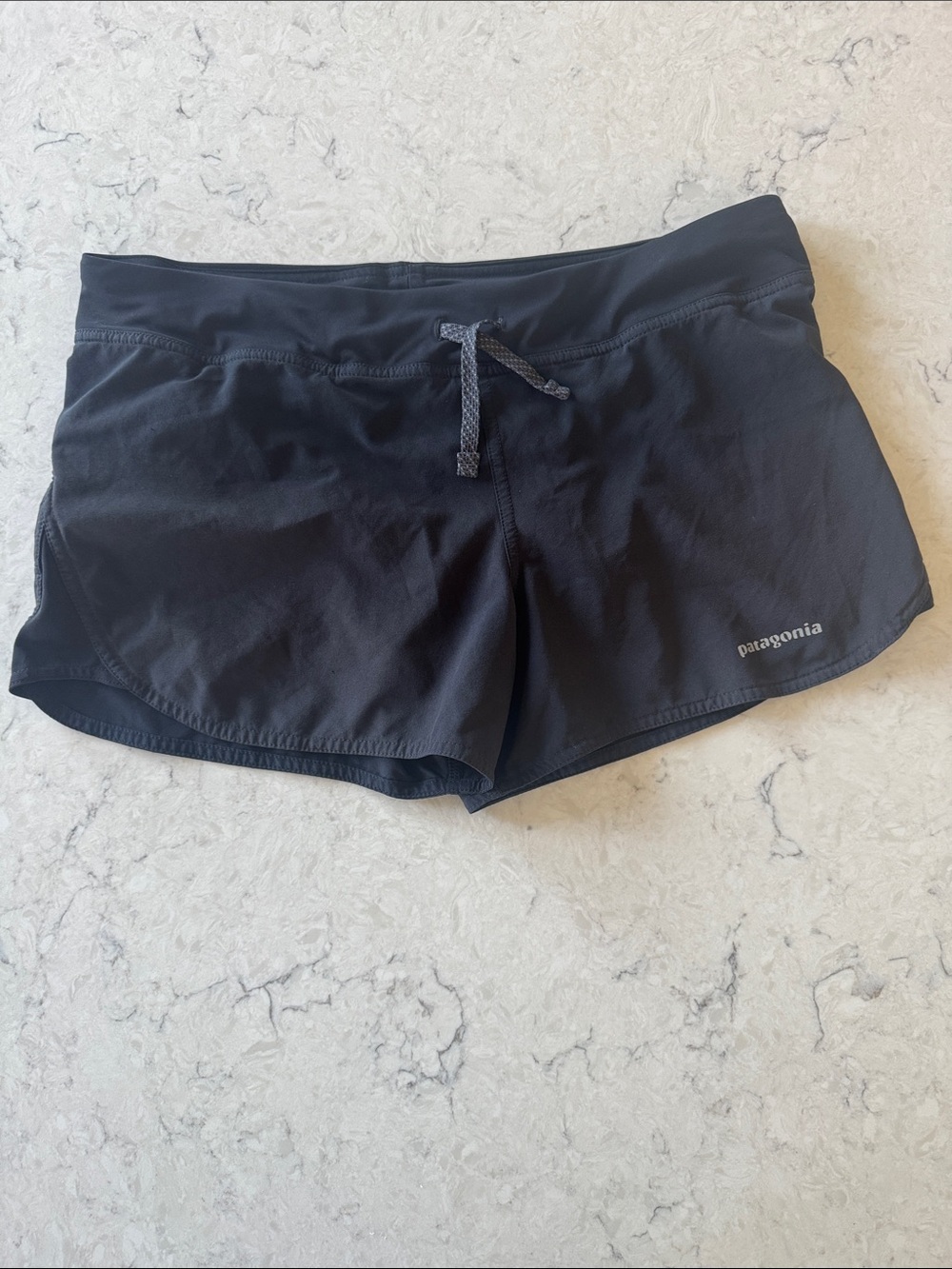 Patagonia Nine Trails Baggies Women’s Black Running Shorts size L 4” inseam